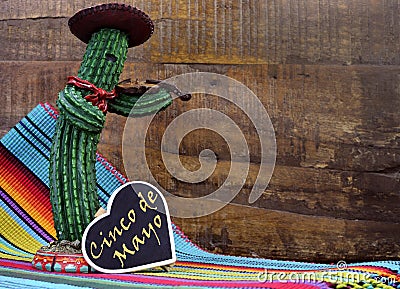 Happy Cinco de Mayo, 5th May, party celebration with with fun Mexican cactus and blackboard sign Stock Photo