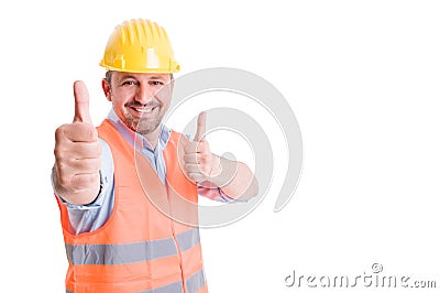 Happy constructor smiling and showing thumbs up Stock Photo