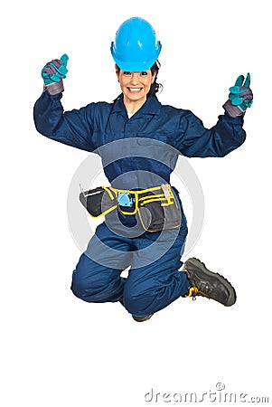 Happy constructor worker woman jumping Stock Photo