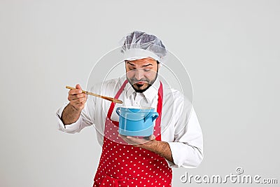 Happy Cooker is Tasting Soup Stock Photo