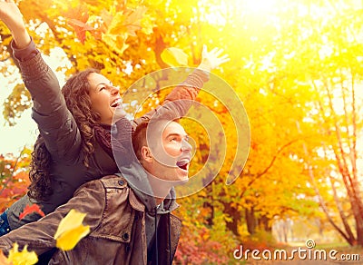 Happy Couple in Autumn Park Stock Photo