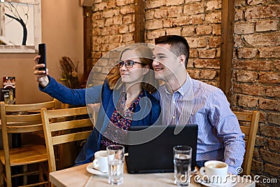 Happy couple in a coffee shop Stock Photo