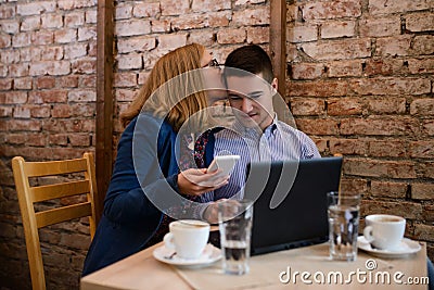 Happy couple in a coffee shop Stock Photo