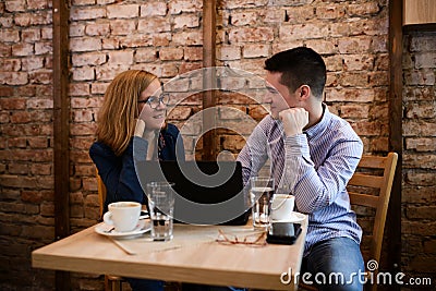 Happy couple in a coffee shop Stock Photo