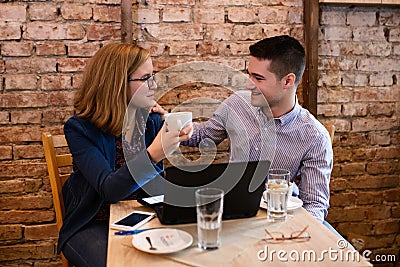 Happy couple in a coffee shop Stock Photo