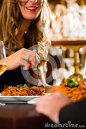 Happy couple have a romantic date in restaurant Stock Photo