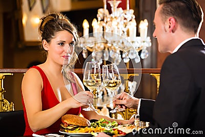 Happy couple have a romantic date in restaurant Stock Photo