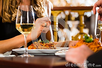 Happy couple have a romantic date in restaurant Stock Photo