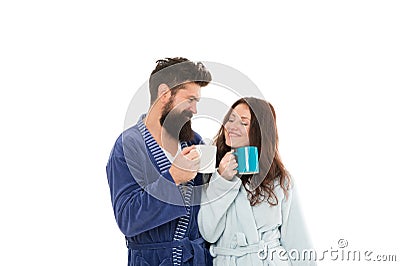 Happy couple having breakfast in bathrobe. wake up with fresh coffee cup. time to relax. feeling cozy and refreshed Stock Photo
