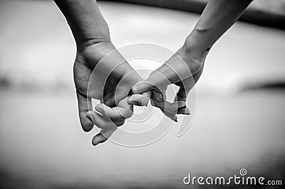 Happy couple holding hands Stock Photo