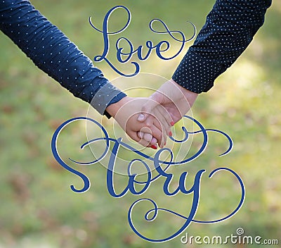 Happy couple holding hands and vintage text Love story. Calligraphy lettering hand draw Stock Photo