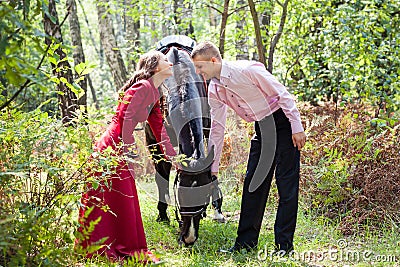 Happy couple and horse Stock Photo