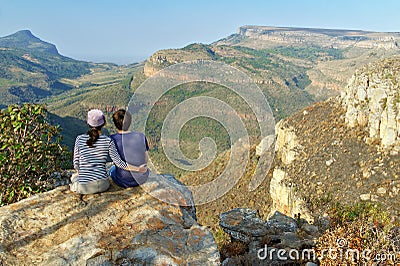 Happy couple looking at beautiful view of Blyde river canyon Stock Photo