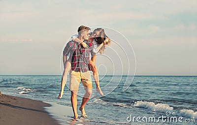 Happy couple in love on beach summer vacations. Stock Photo