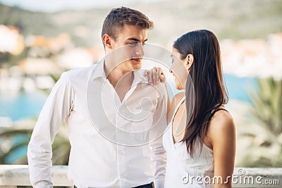 Happy couple in love on a summer holiday vacation.Celebrating holiday,anniversary,engagement. Woman laughing at a joke Stock Photo