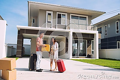 Happy couple move to new house Stock Photo