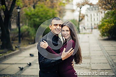 Happy couple posing in city Stock Photo