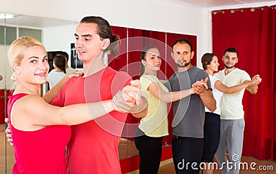 Happy couple practicing slow dance Stock Photo