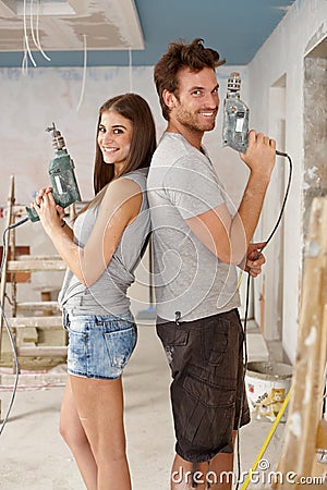 Happy couple renewing home Stock Photo