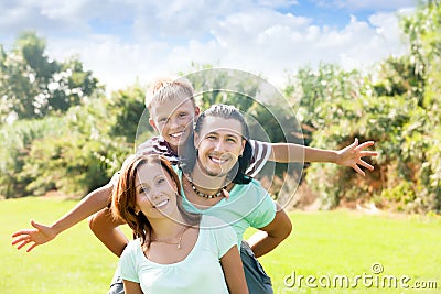 Happy couple with teenager child Stock Photo