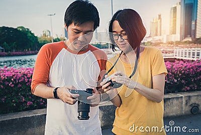 Happy couple with their camera Stock Photo
