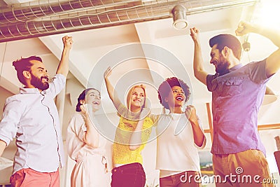 Happy creative team in office Stock Photo