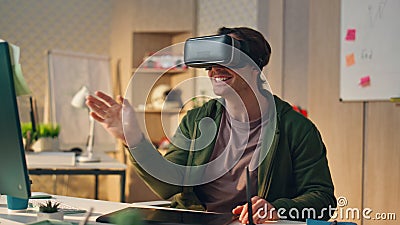 Happy creator swiping metaverse nft office closeup. Man developer testing game Stock Photo