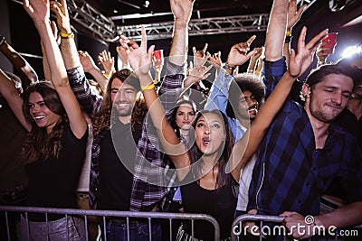 Happy crowd enjoying at music festival Stock Photo