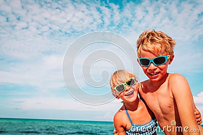 Happy cute little boy and girl enjoy beach Stock Photo