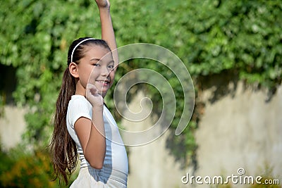 A Happy Cute Philippina Kid Outside Stock Photo