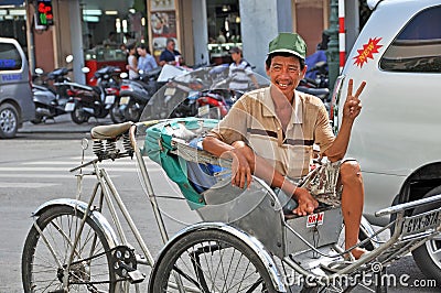 Happy Cyclo Driver at Ben Tanh Market. Editorial Stock Photo