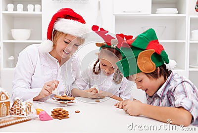 Happy decorating gingerbread cookies Stock Photo