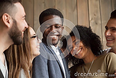 Happy diverse black and white people group smiling bonding toget Stock Photo