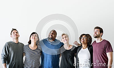 Happy diverse friends standing together Stock Photo