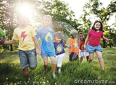 Happy diverse kinds in the park Stock Photo