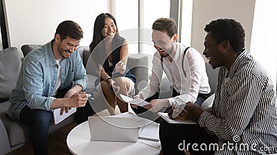 Happy diverse team people laughing working together at corporate briefing Stock Photo