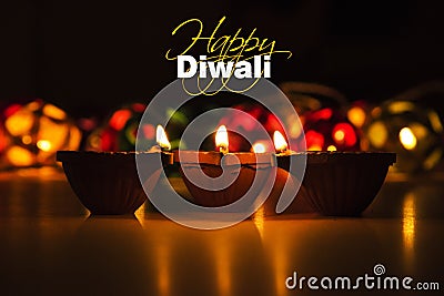 Happy diwali - diwali greeting card with illuminated diya Stock Photo