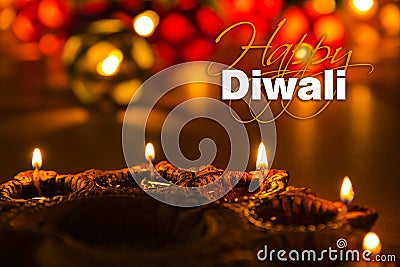 Happy diwali - diwali greeting card with illuminated diya Stock Photo