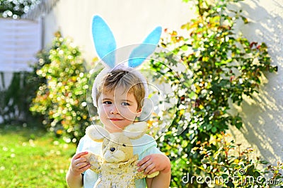 Happy easter. Easter background. Cute bunny. Child boy wearing bunny ears. Kid preparing for Easter. Happy family and Stock Photo