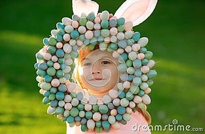 Happy easter bunny child boy. Spring kids holidays concept. Funny kids face closeup. Stock Photo