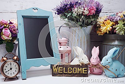 Happy Easter with bunny rabbit and space copy wooden easel background Stock Photo