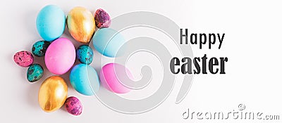 Happy easter concept. Big small eggs of various fashionable colors lie in pile on a white background text Happy Easter. Stock Photo