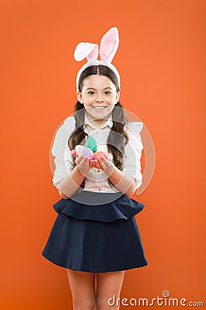 Happy easter. Easter Egg Hunt. Easter eggs and cute bunny. child wearing bunny ears on Easter day. Funny decoration Stock Photo