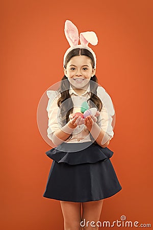 happy easter. Easter Egg Hunt. Easter eggs and cute bunny. child wearing bunny ears on Easter day. Funny decoration Stock Photo