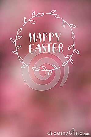 Happy Easter lettering calligraphy on lens defocused pink blossom background. Holiday postcard, poster, banner, greeting card Stock Photo