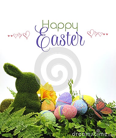 Happy Easter scene with moss bunny and colorful glitter eggs, Stock Photo