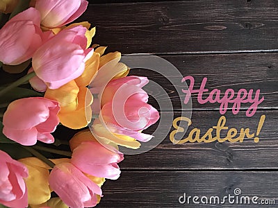 Happy Easter sign with tulips Stock Photo