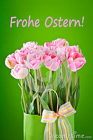 pink tulip flowers Happy Easter text german Stock Photo