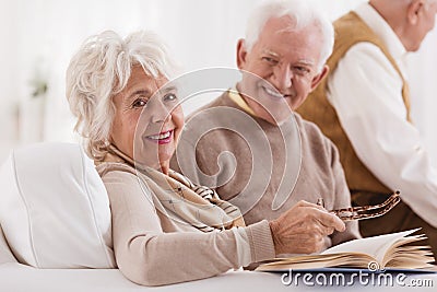 Happy elder is looking at wife Stock Photo