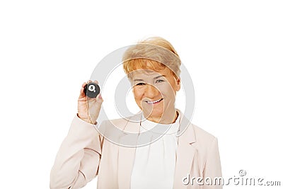 Happy elderly business woman holding eight billard-ball Stock Photo